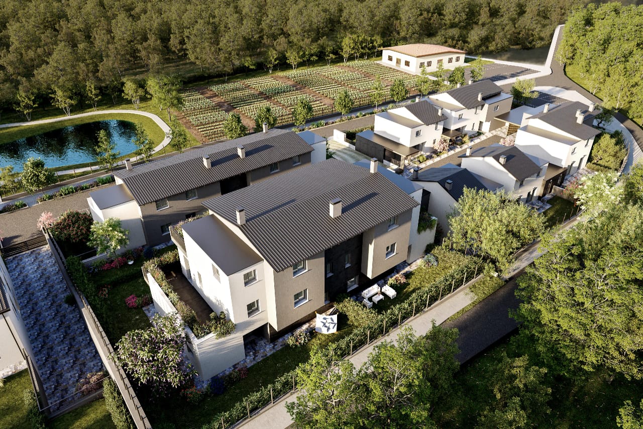 Rendering fotorealistico di esterno - Complesso residenziale vista aerea laghetto bosco - Archivision Studio
